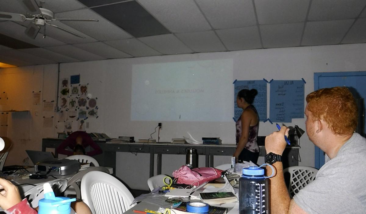 Alyssa and MC presenting their Mollusks and Annelids organism project 